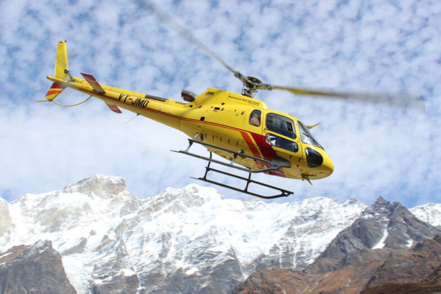 A panoramic view of the lush greenery and enchanting landscapes experienced during the helicopter ride on the Char Dham Yatra, providing a unique perspective of the journey.